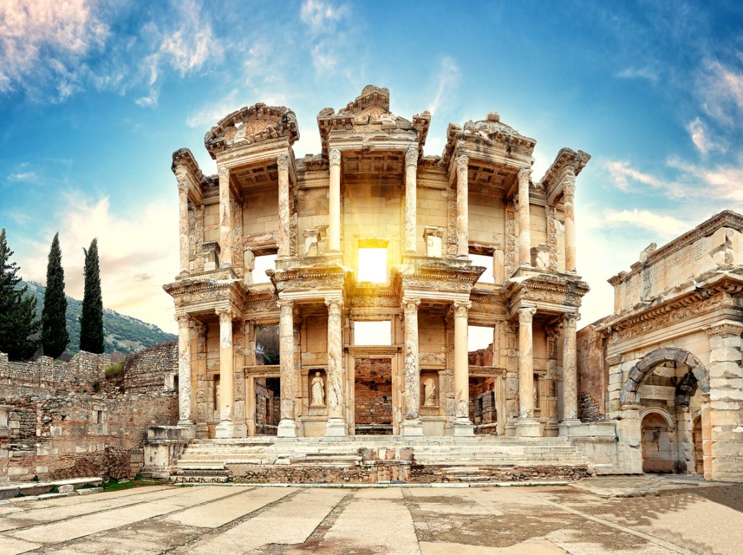 Facade of the antique library of Celsus in Ephesus on a sunny day. Turkey. Panorama