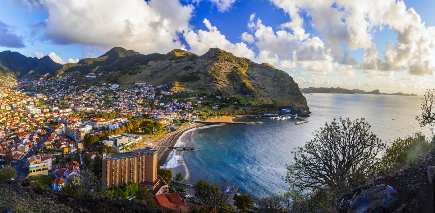Breathtaking scenery of Madeira island, View of Machico town and beautiful bay with sandy beach. Eastern part of the island. Portugal travel