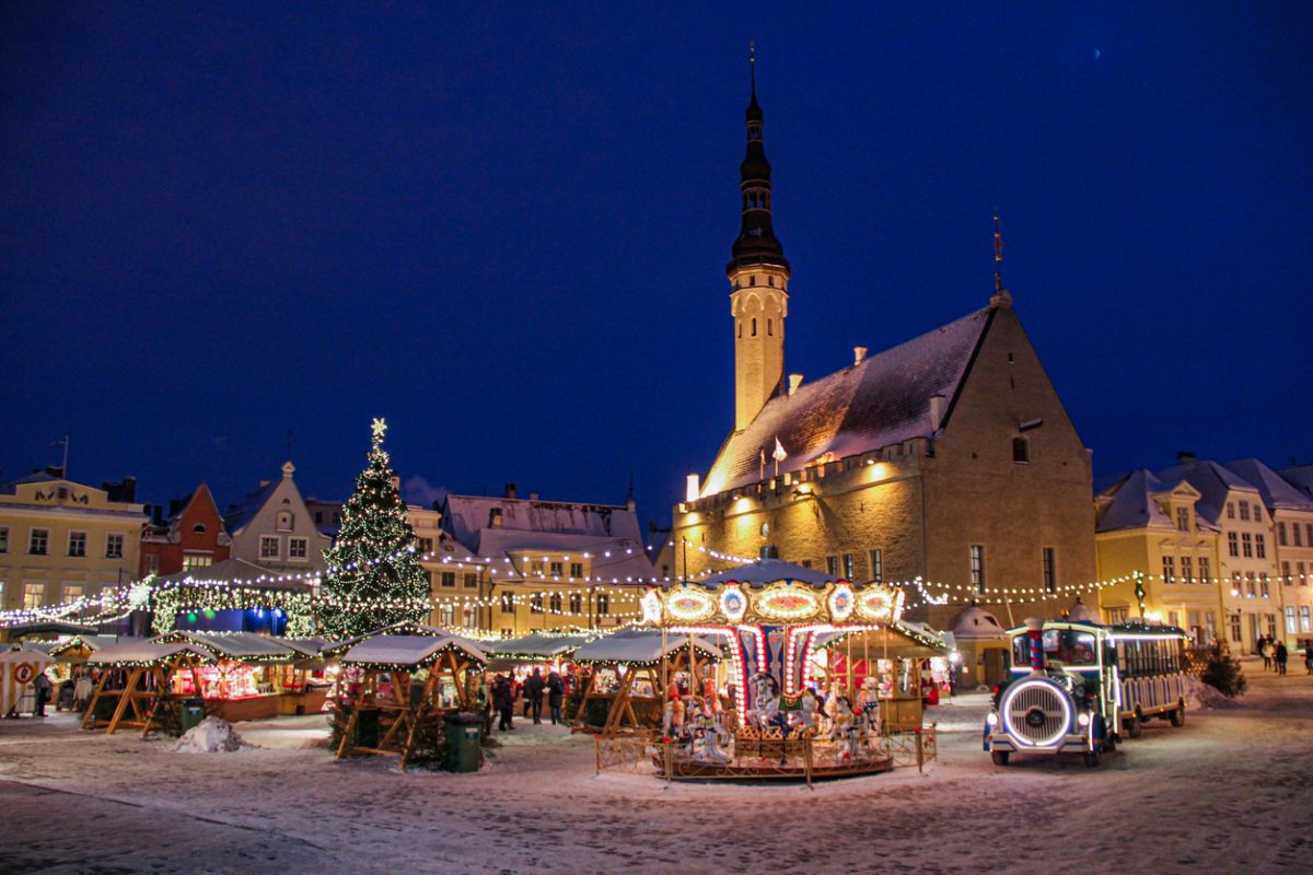 Central Market in Tallinn before Christmas with a giant Christmas tree in the middle