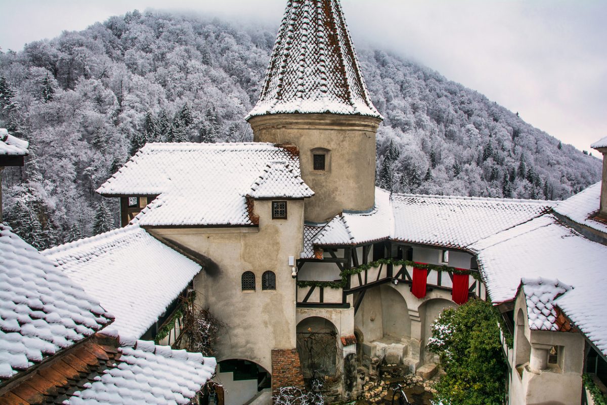 Bran Castle On A Snowy Winter Day, Transylvania. Travel And Tourism. Medieval.