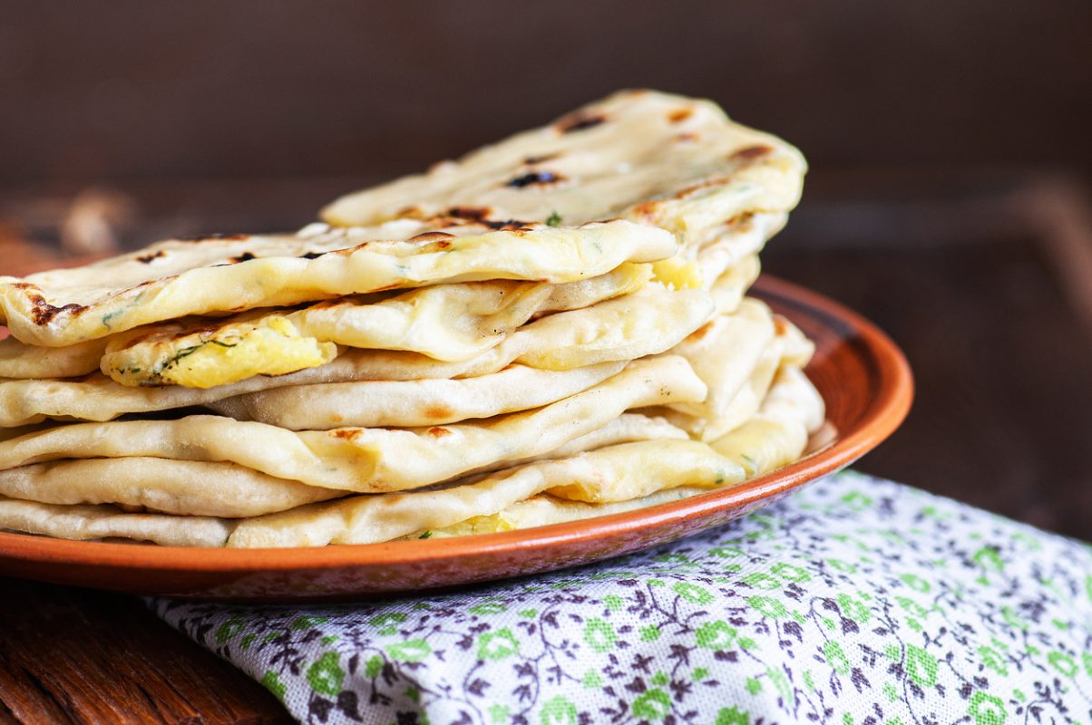 Khychin - traditional flatbreads stuffed with mashed potatoes and greens.