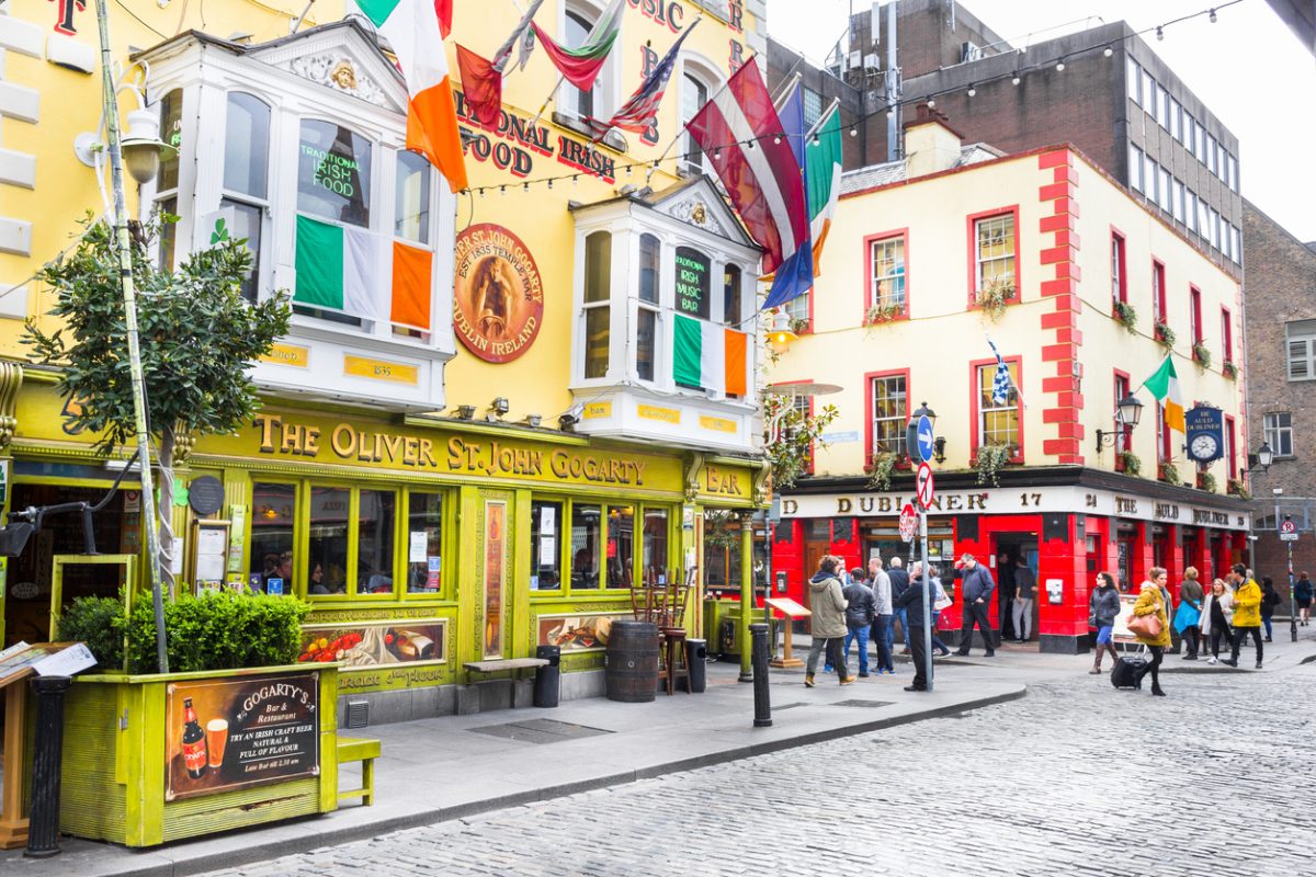 Dublin, Ireland - May 5, 2016: Tourists walking in the Temple Bar area.