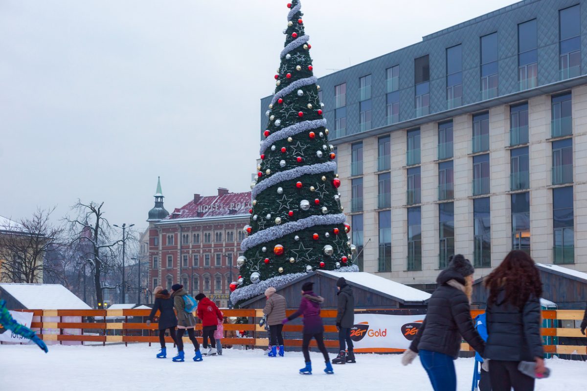 KRAKOW, POLAND - JANUARY 06, 2016: Christmas tree near city ice rink in historical center of Krakow.
