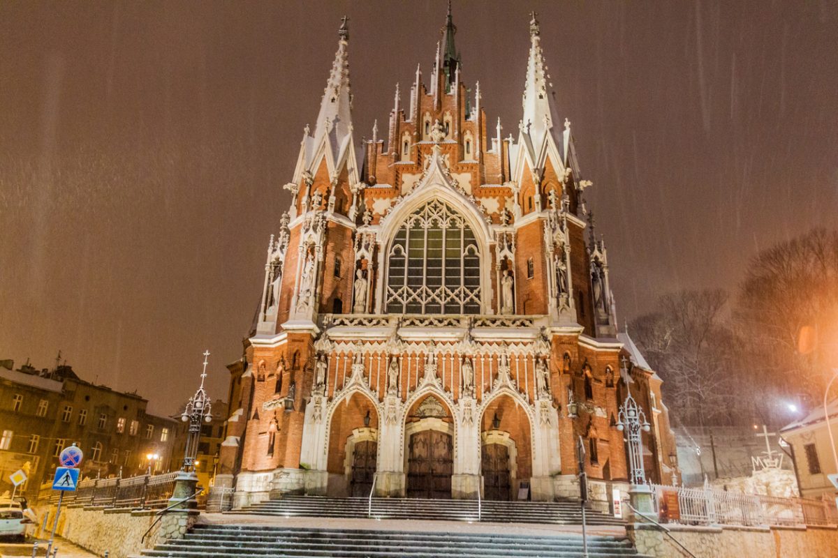 Night snowy view of St. Joseph's Church in Krakow, Poland