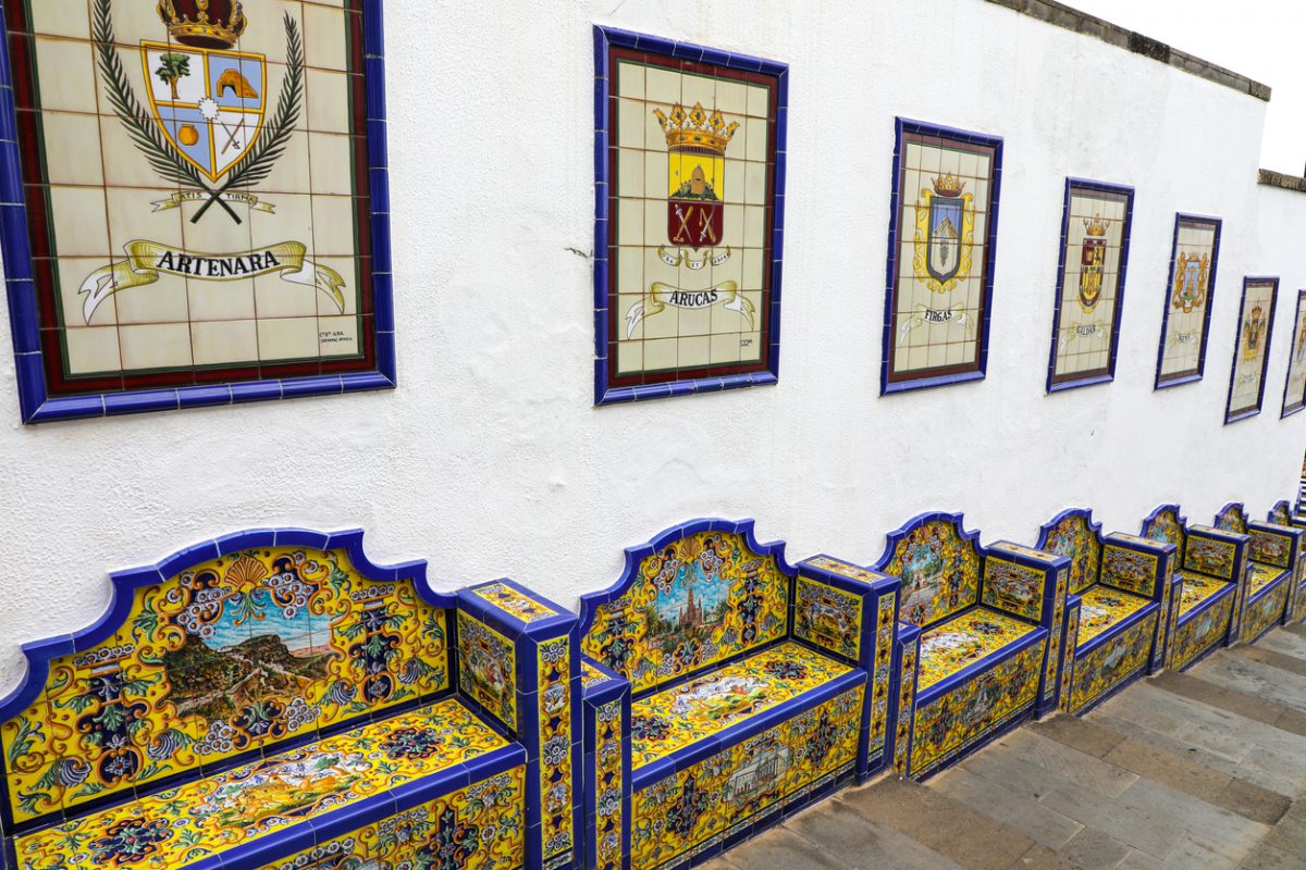 Ornate tile benches along the Paseo de Gran Canaria waterfall in village of Firgas Grand Canary Island Spain