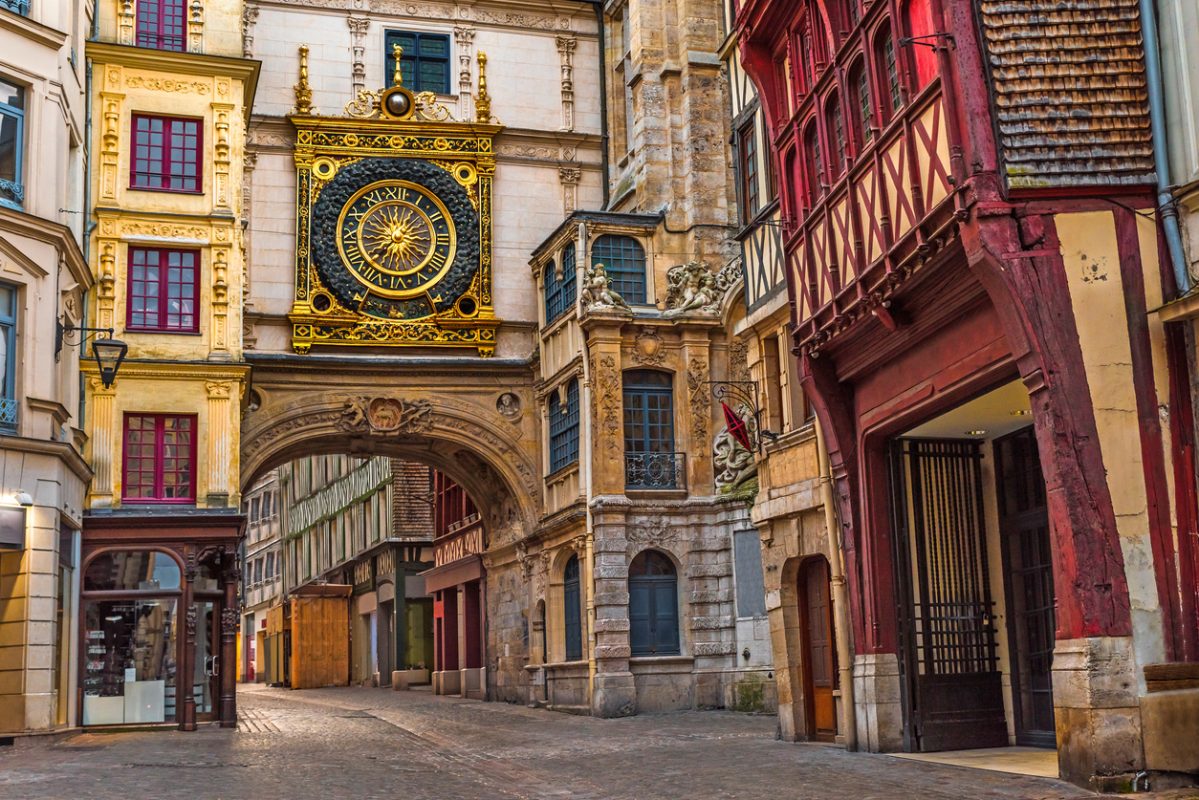old cozy street in Rouen with famos Great clocks or Gros Horloge of Rouen, Normandy, France with nobody