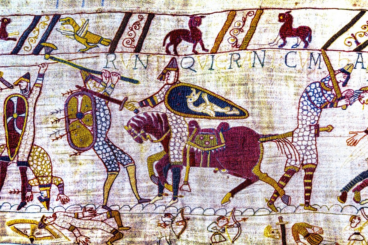 Colorful Medieval Bayeux Tapestry Bayeux Normandy France. Created 11th century right after Battle Hastings 1066 AD showing Norman Conquest England. Shows Battle and deaths in lower panel