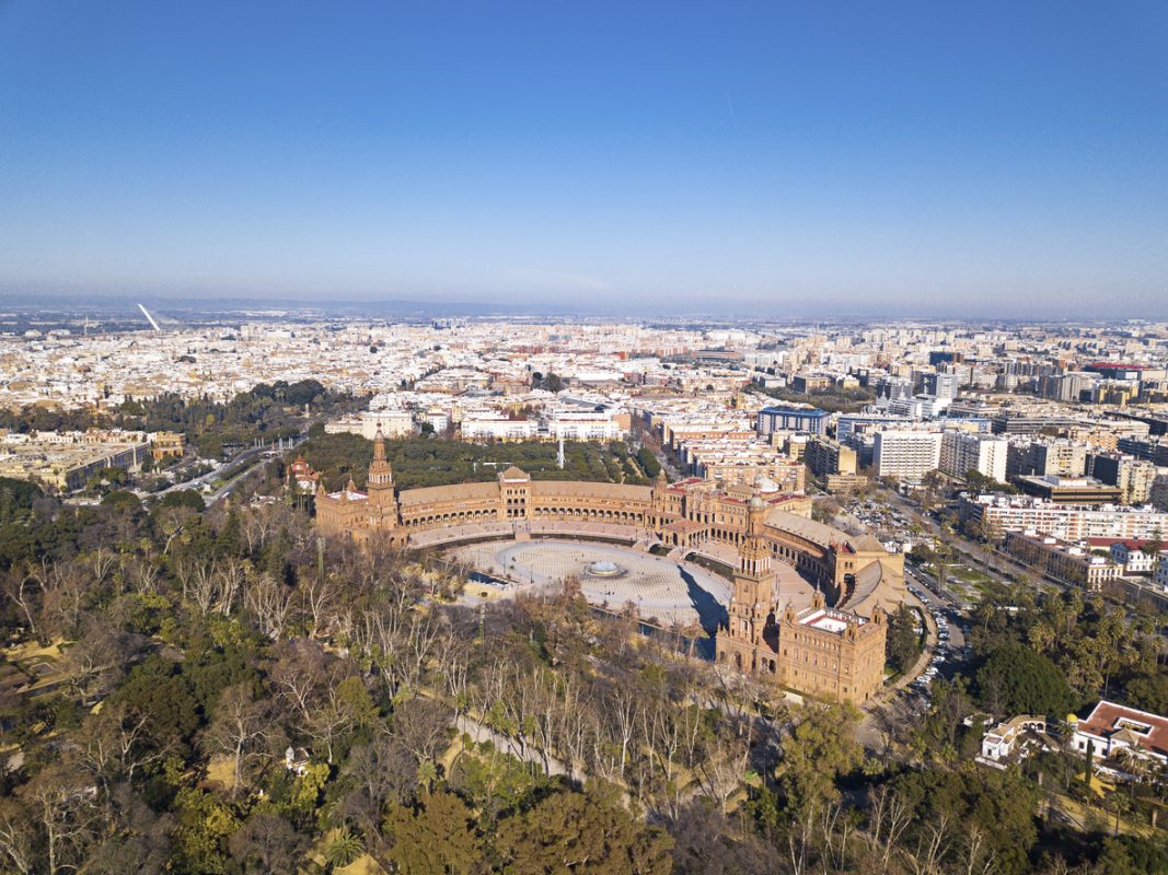 Aerial view of beautiful city of Seville , capital of Andalusia Province in south of Spain, Costa del Sol. Beautiful Spanish Square in the centre of Seville. Panoramic view of Seville city in winter