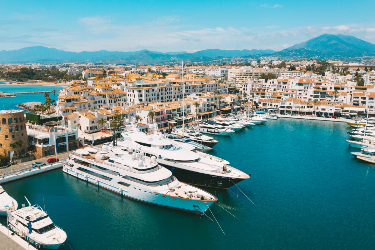 Aerial top view of luxury yachts in Puerto Banus marina, Marbella, Spain. High quality photo