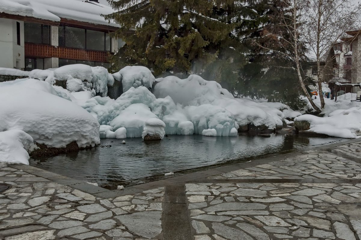 Frozen karst fountain in Bansko town at winter, Pirin mountain, Bulgaria
