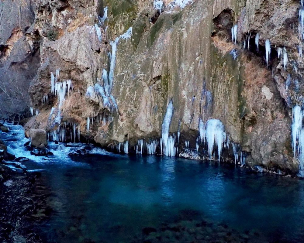 Krka waterfall frozen over during the winter in Croatia