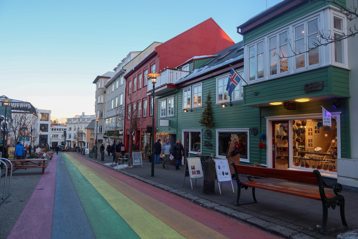 Shops and restaurants lining the rainbow road of Reykjavik