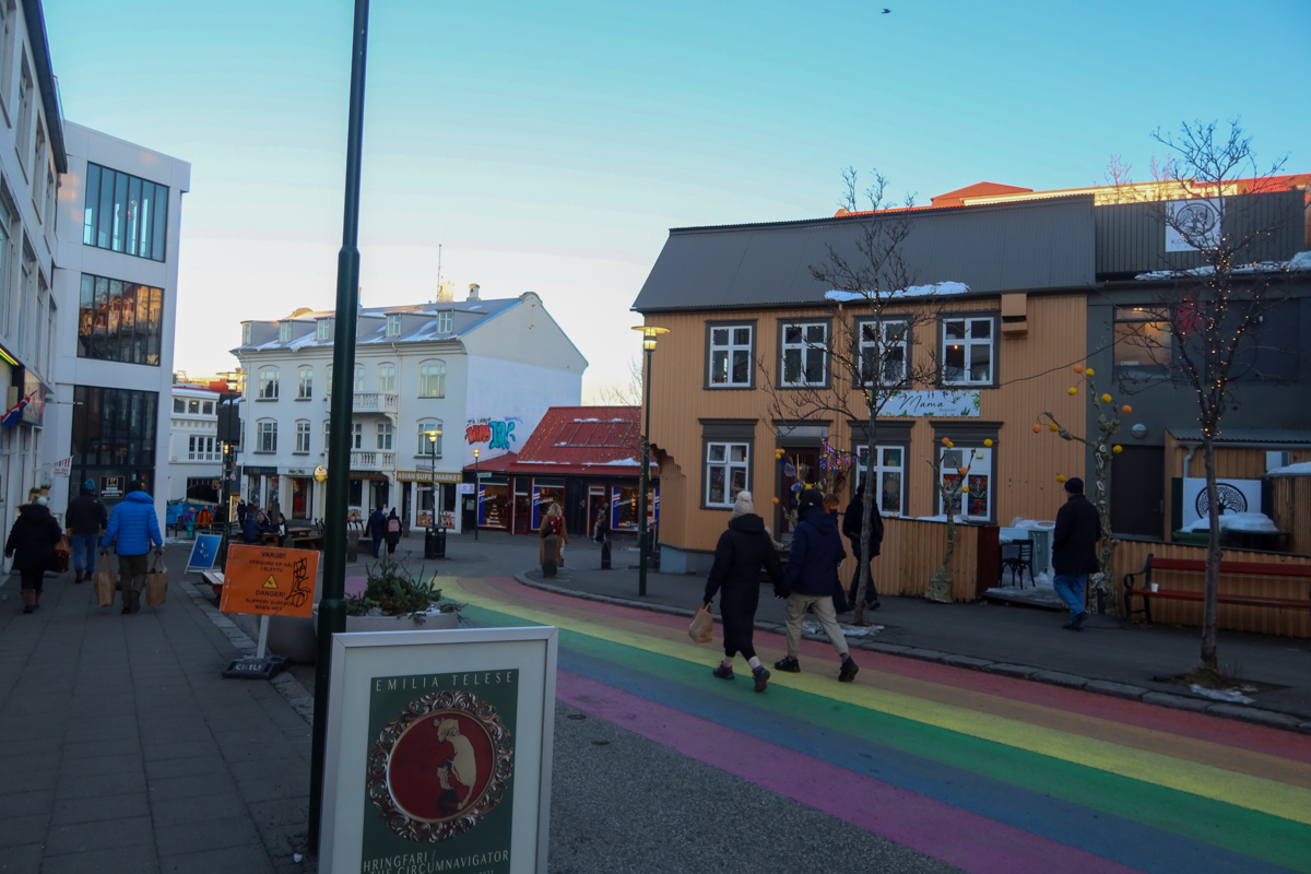 People walking on Rainbow Street in Reykjavik in Iceland