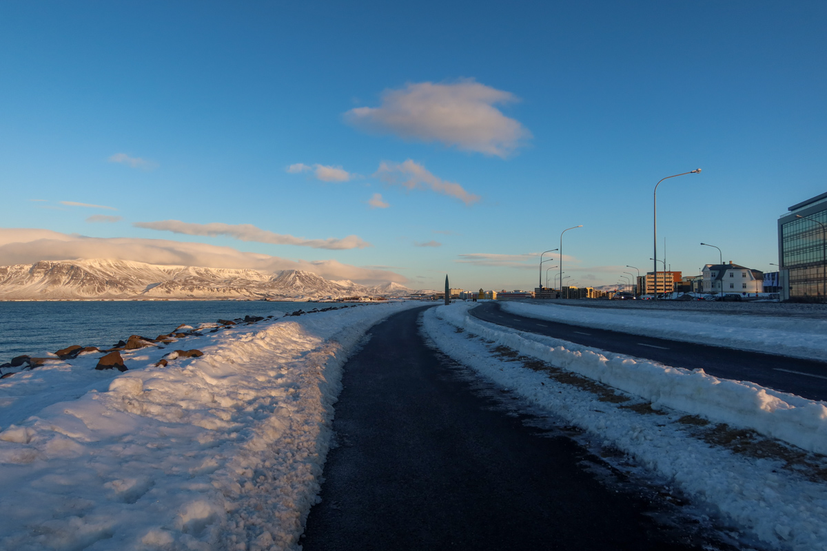 The coastline of Reykjavik with snow on either side. 