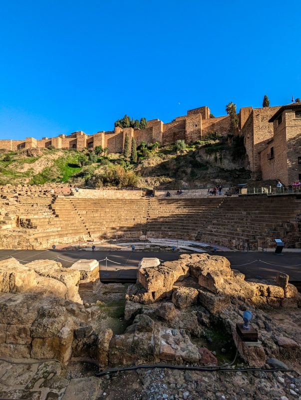 View of Alcazaba, a Moorish palace with Roman ruins in the foreground. 