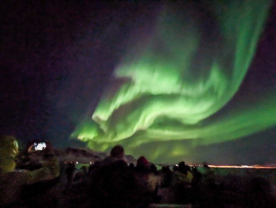 The Northern Lights, bright in the sky, from a boat from Reykjavik in Iceland in January. 