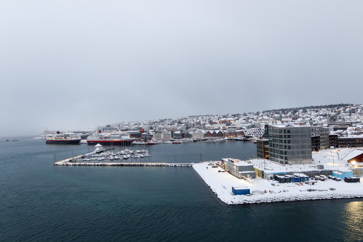 View of Arctic harbour covered in snow