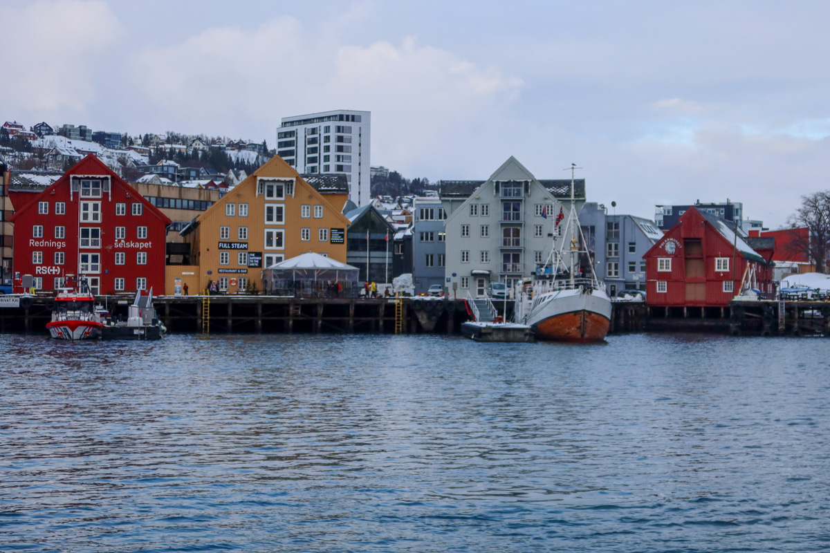 View of the classic Norwegian houses over the fjord water