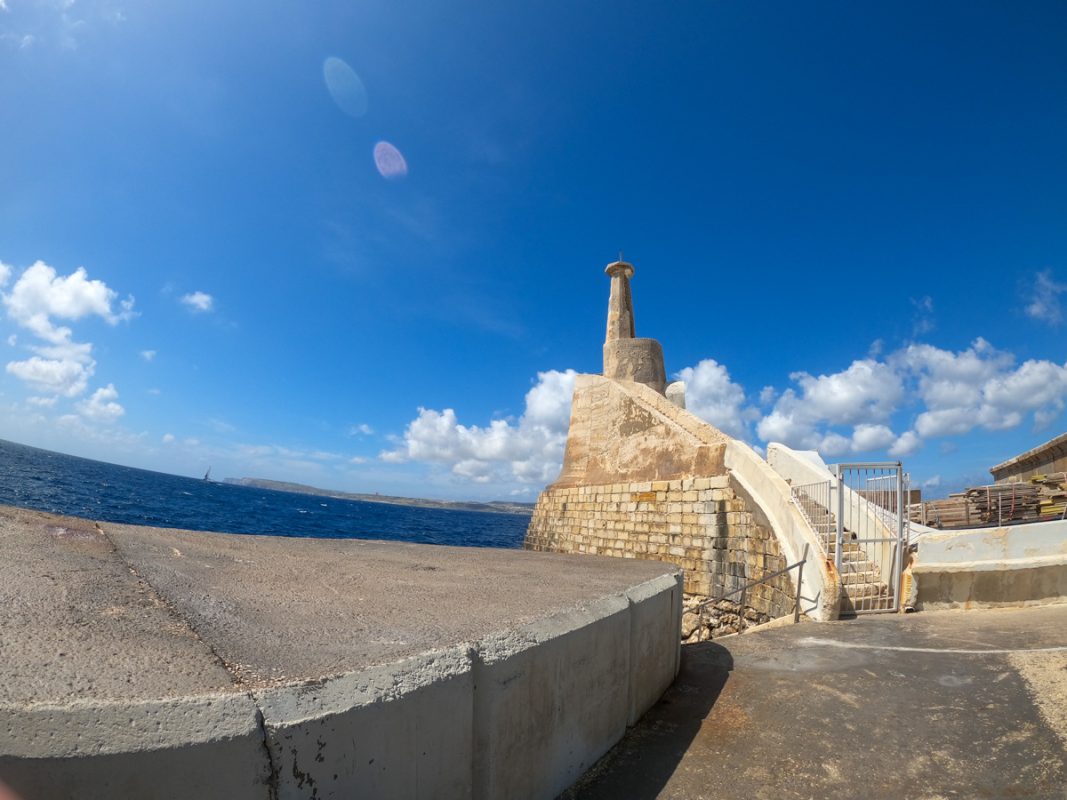 The Cirkewwa dive sites with a lighthouse as a landmark