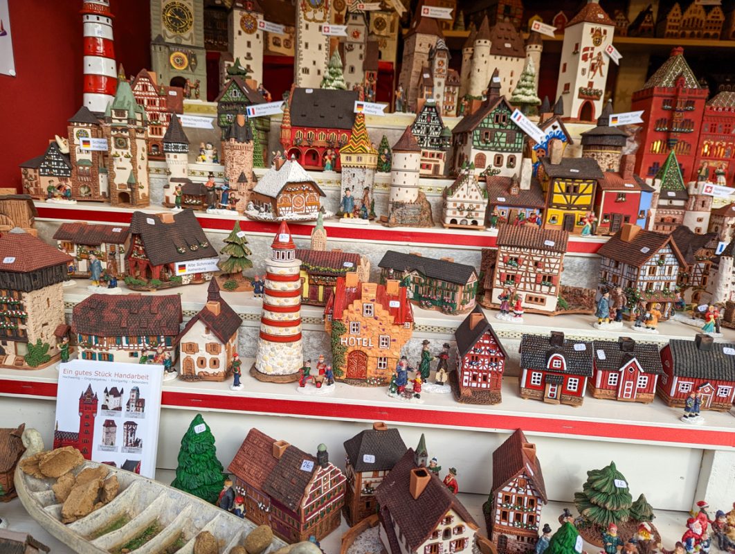 Christmas themed houses on a stall in Basel festive market.