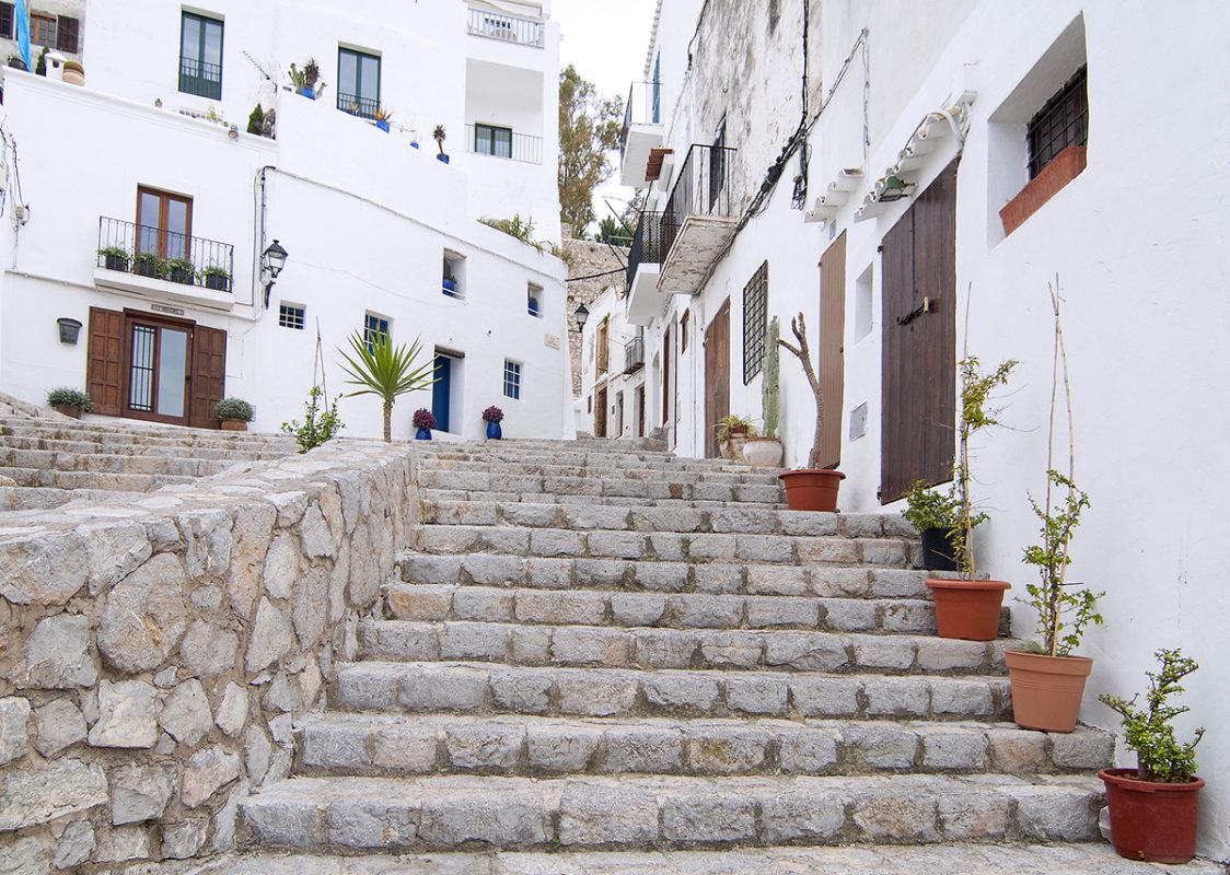 Dalt Vila in Ibiza, Spain, white painted houses and cobblestone steps 