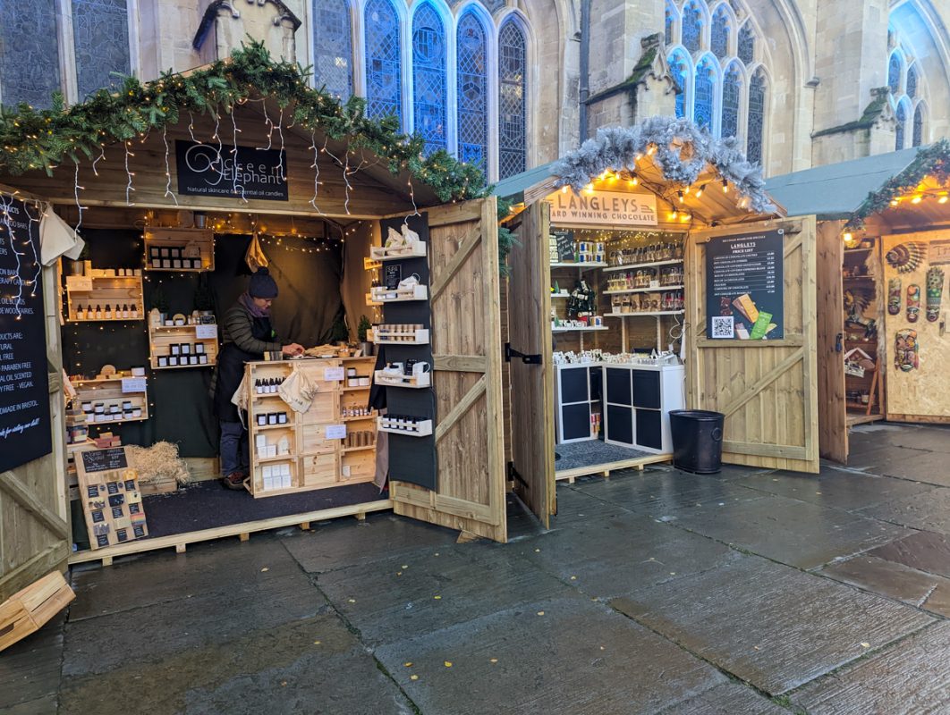 Bath Christmas Market, festive stalls in front of the Abbey