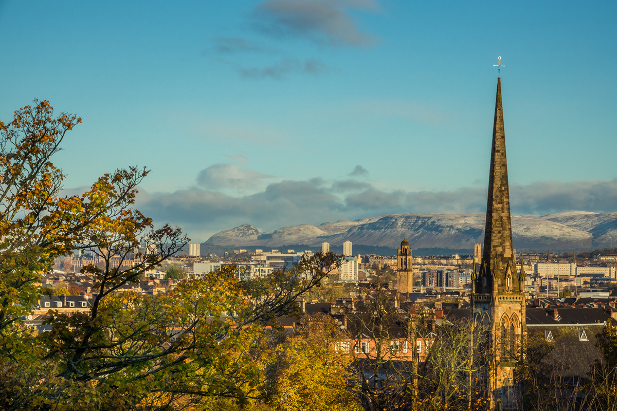 View Across the City of Glasgow Scotland in Autumn With Snow on the Campsies and Ben Lomond