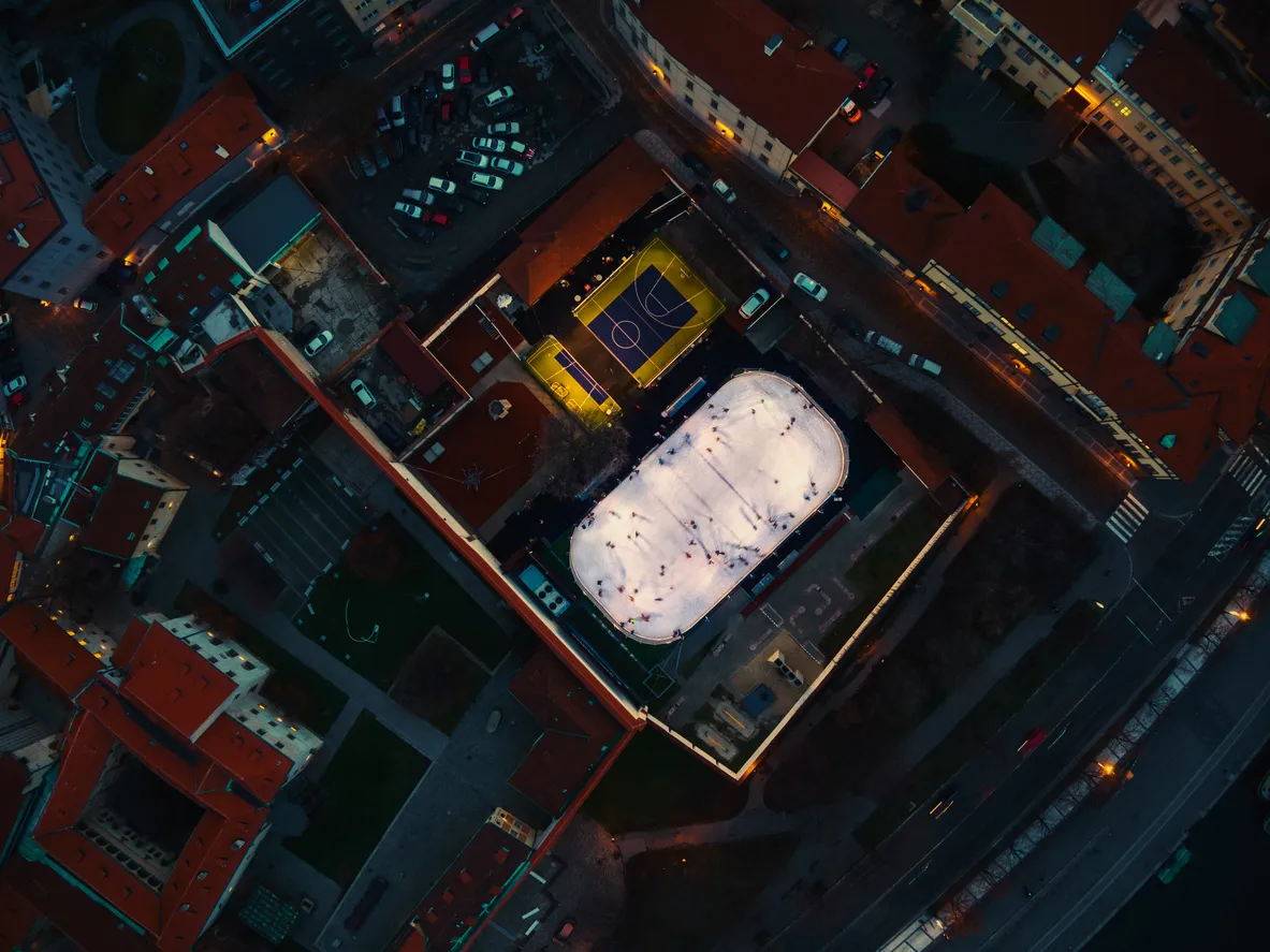 drone fly over ice skating in prague