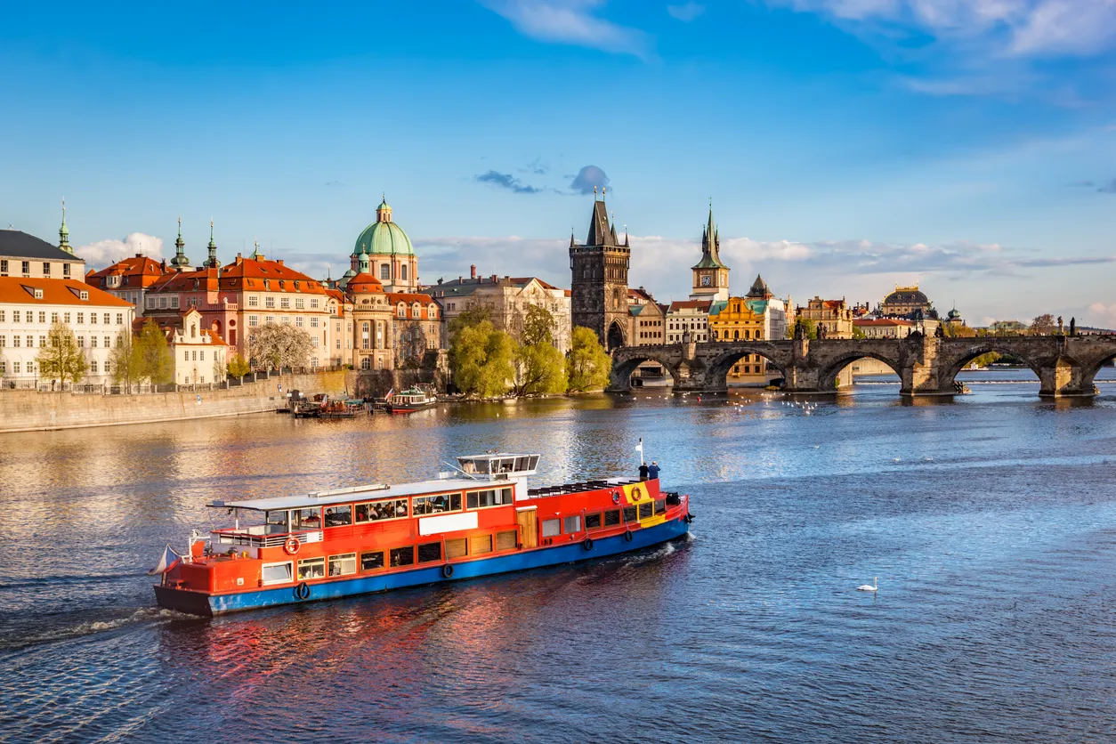 Prague, Czech Republic skyline with historic Charles Bridge. Boat cruise on Vltava river