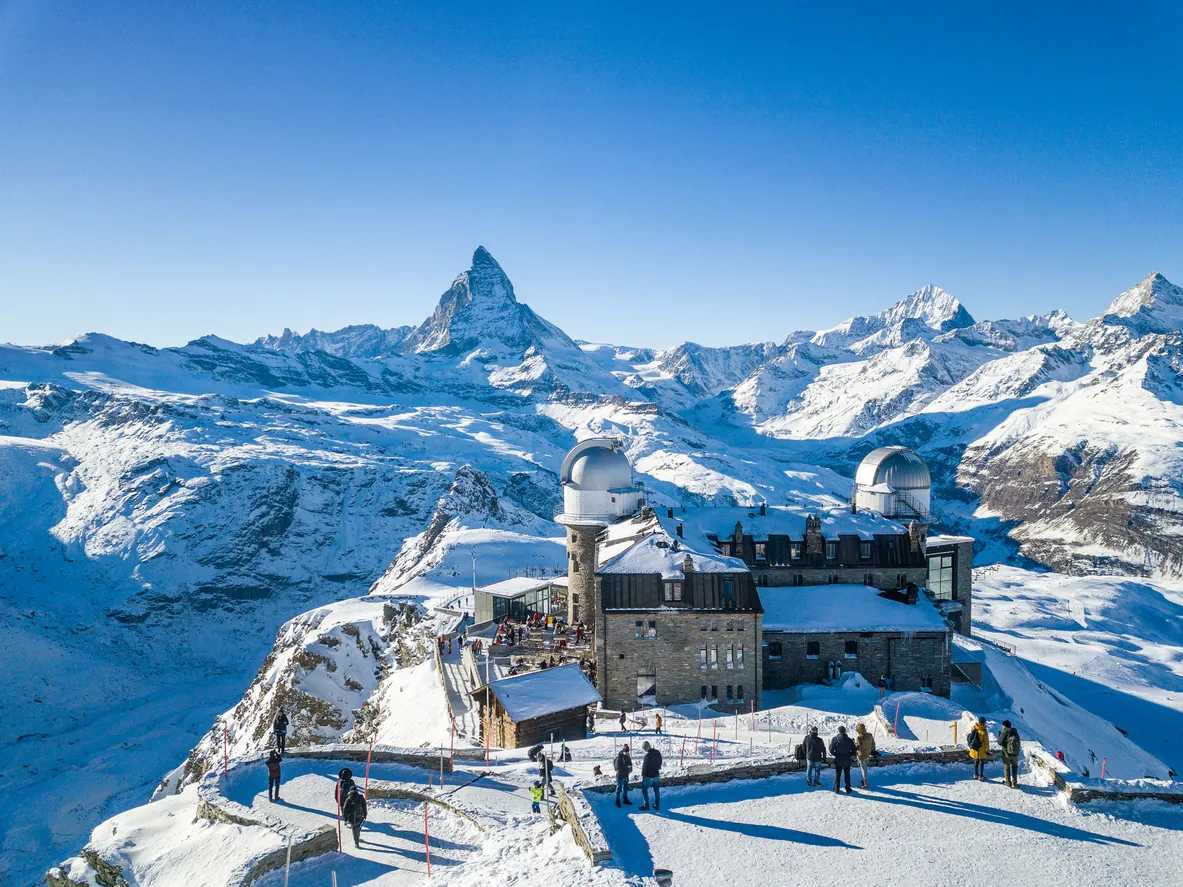 Gornergrat, Switzerland - January 06. 2022: Aerial image of the Gornergrat with the famous Matterhorn at the background in the Swiss town Zermatt.