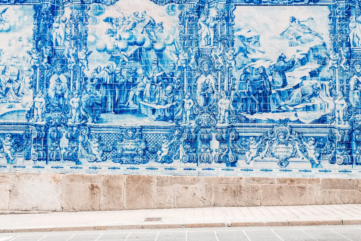 porto, portugal. 10th august, 2021: saint ildefonso is a famous blue tiled church located at porto old town