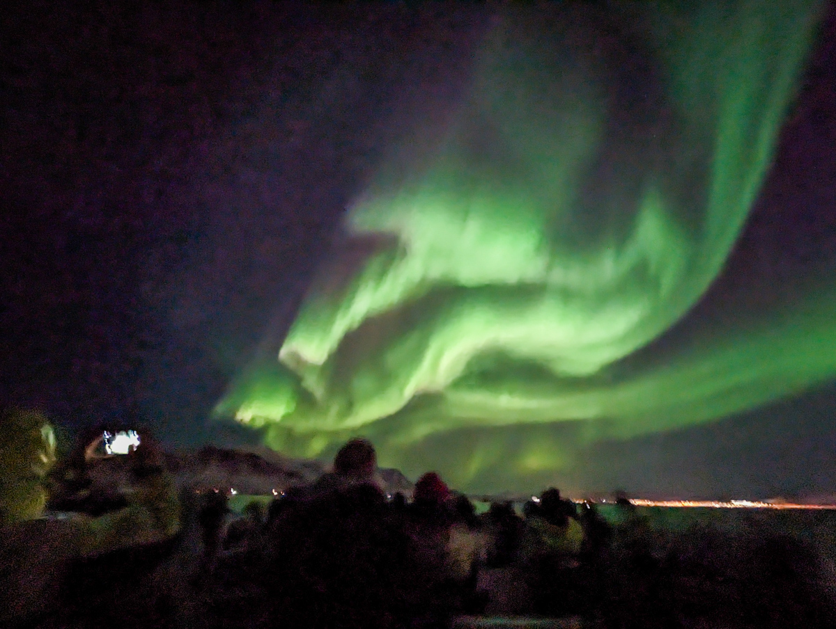 The Northern Lights, bright in the sky, from a boat from Reykjavik in Iceland in January.