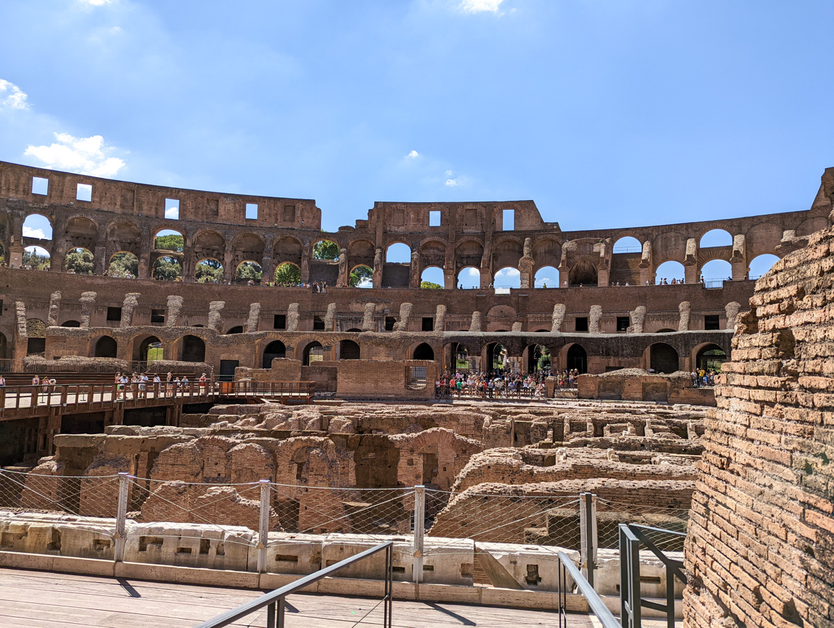 View of the colosseum with a few people