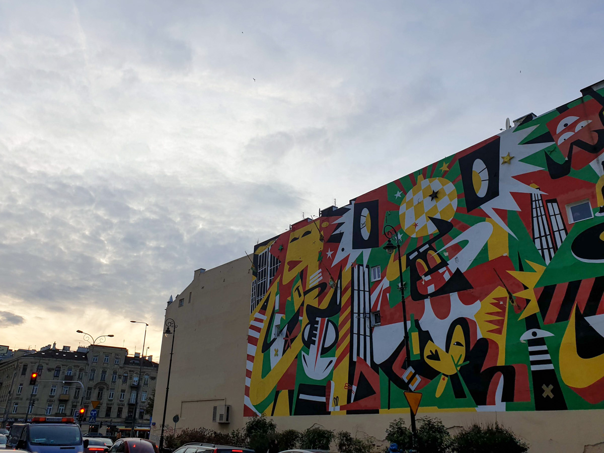 Street art in Warsaw in the Praga district. Big, colourful mural.