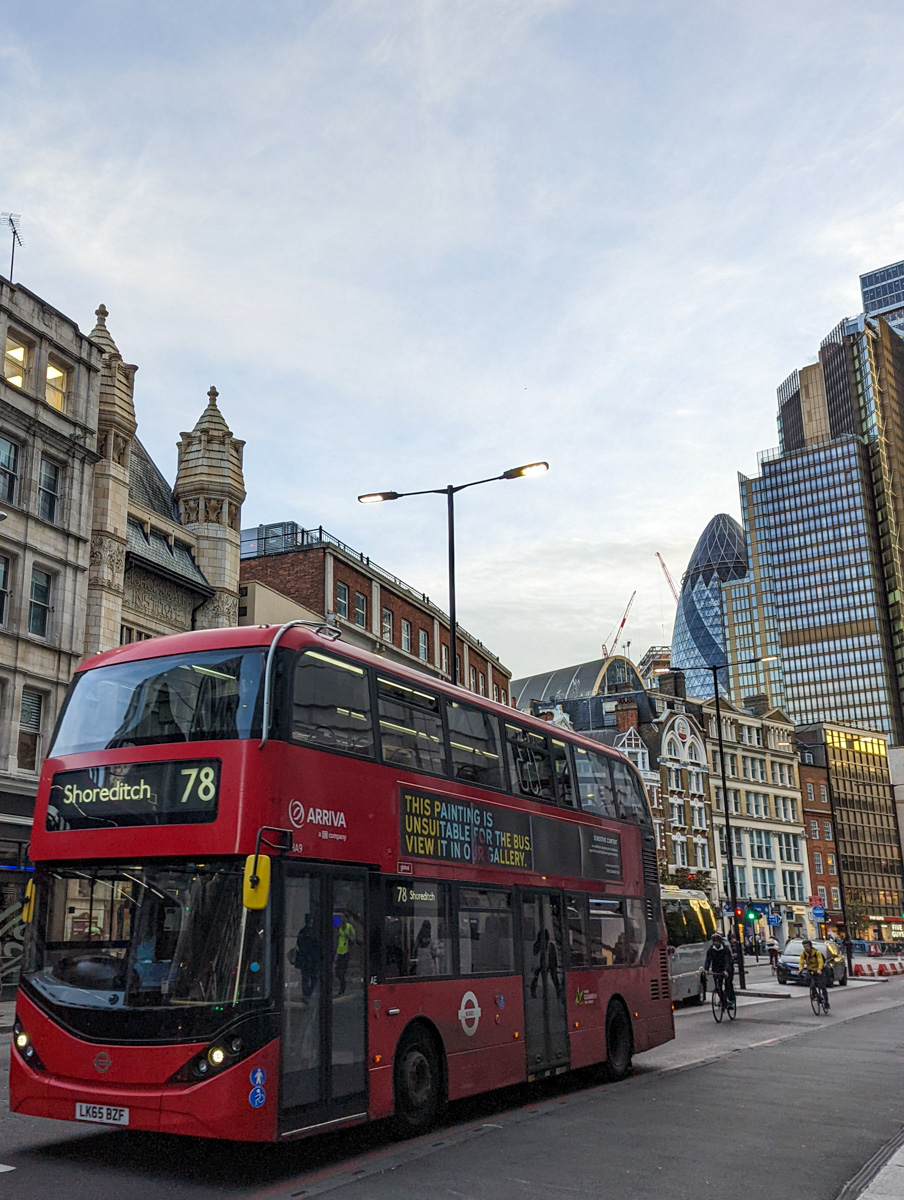London bus and buildings around in November