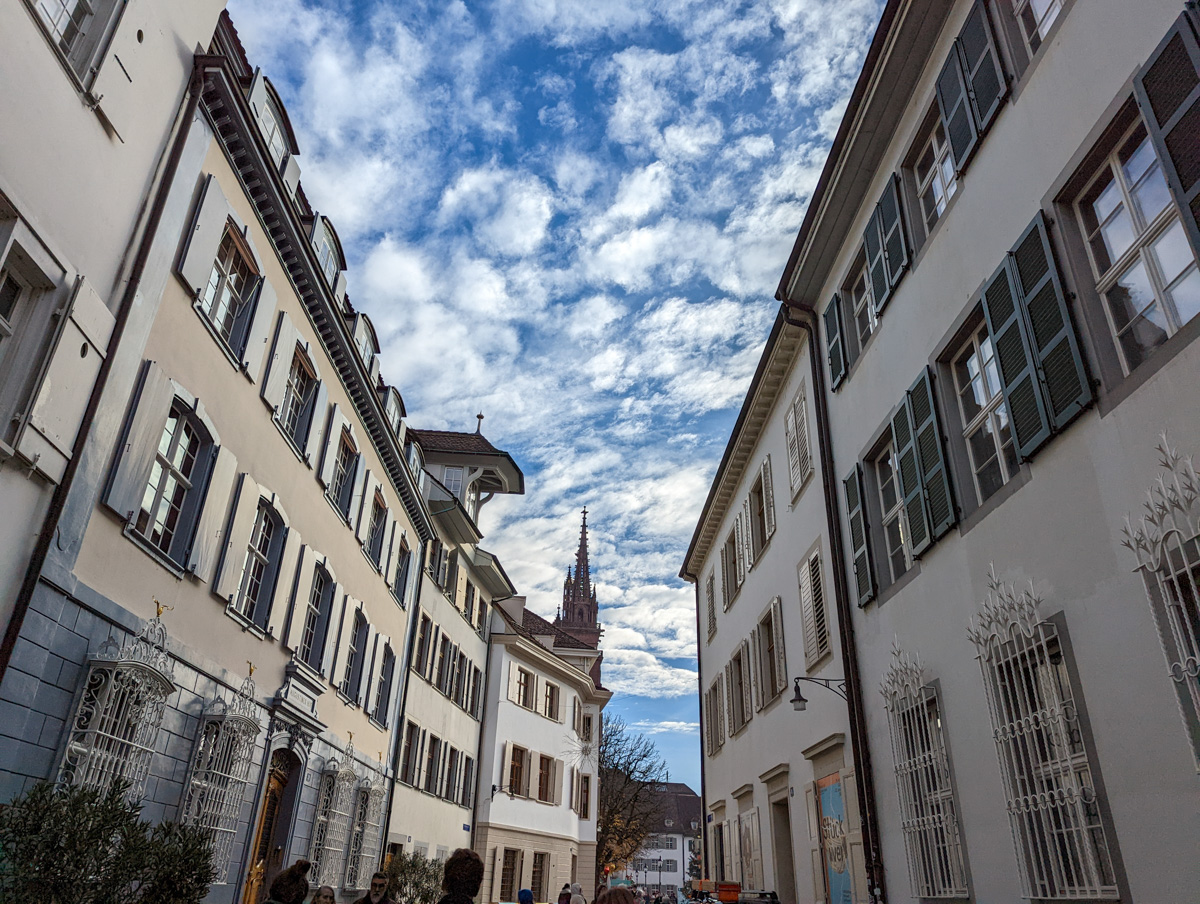 Terraced houses with cathedral in the background.