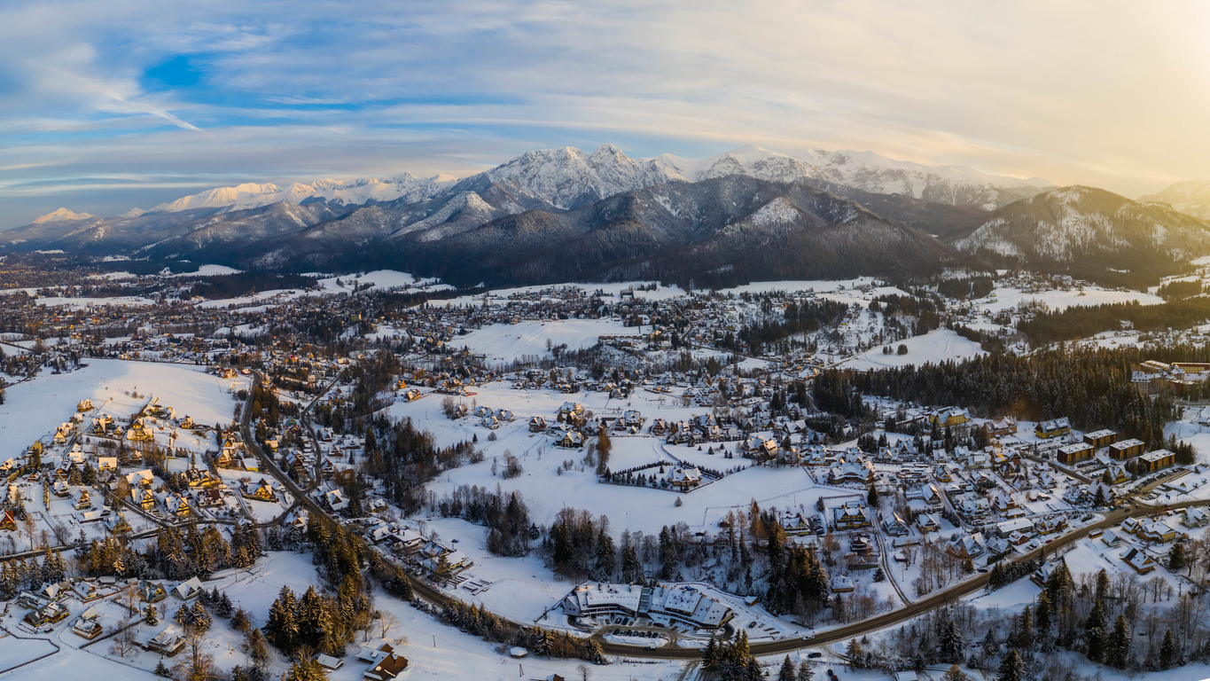 Aerial landscape with tatra mountains and Zakopane, winter scenery of Giewont Peak.