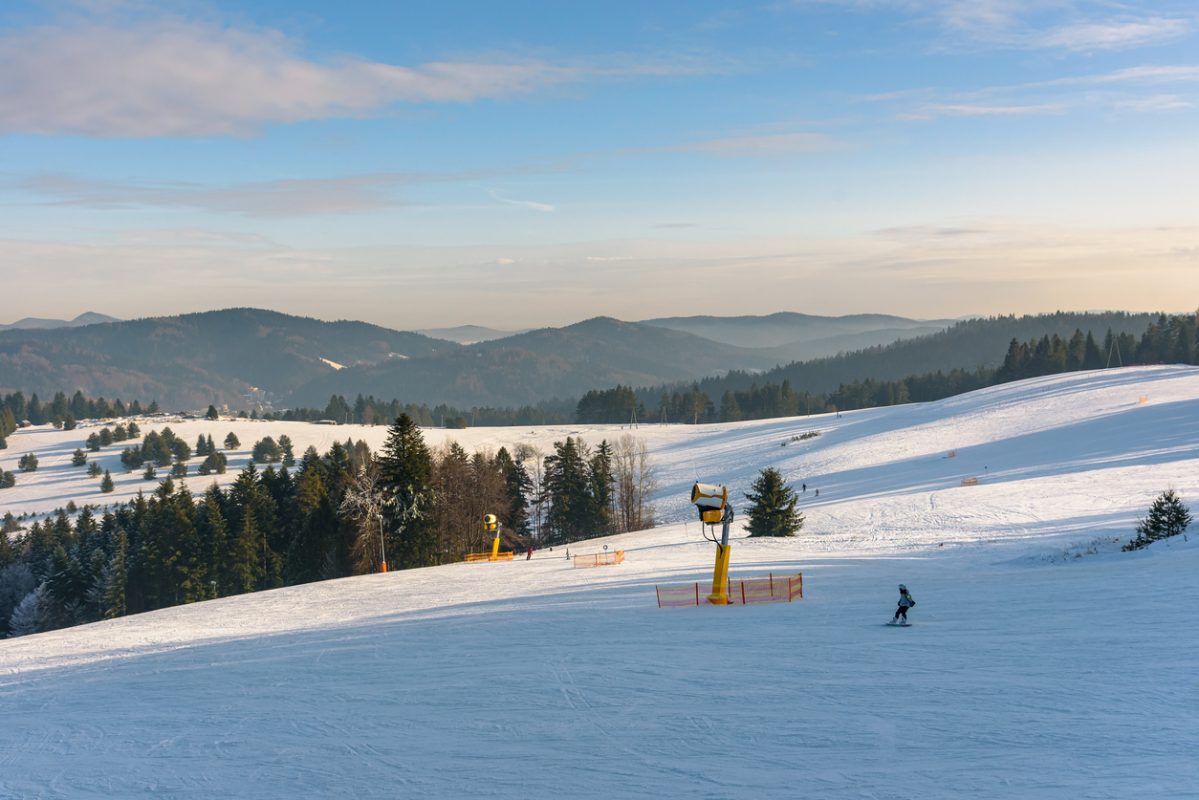 Panoramic winter view of Beskid Sadecki mountains from ski slope in Krynica Zdroj, Poland
