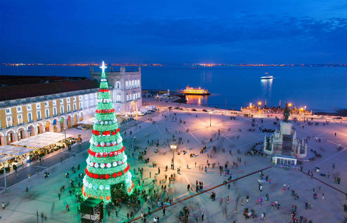 Christmas tree on Commerce square at twilight in Lisbon, Portugal