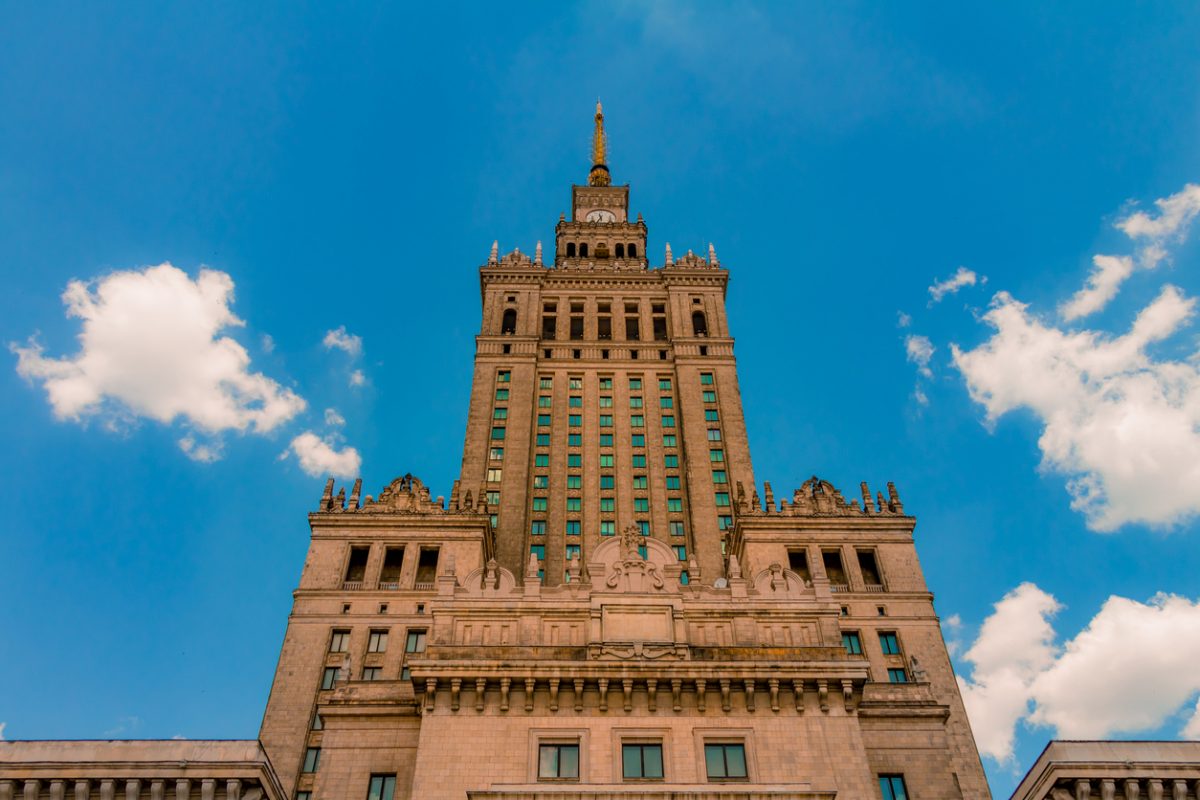 The Palace of Culture and Science of Warsaw from a low angle view. An historical public cultural institution and the tallest building in Poland.