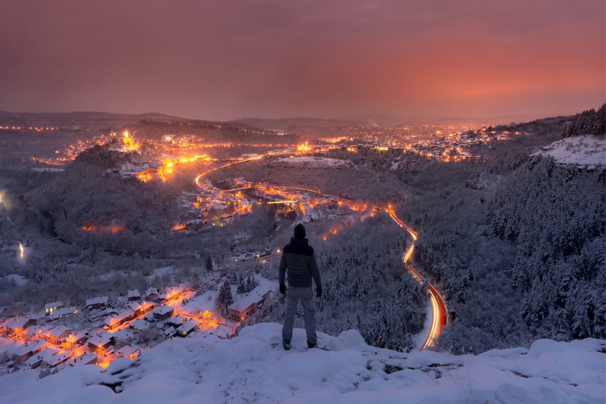 Night view from the edge of the cliffs in the winter towards the city of Veliko Turnovo