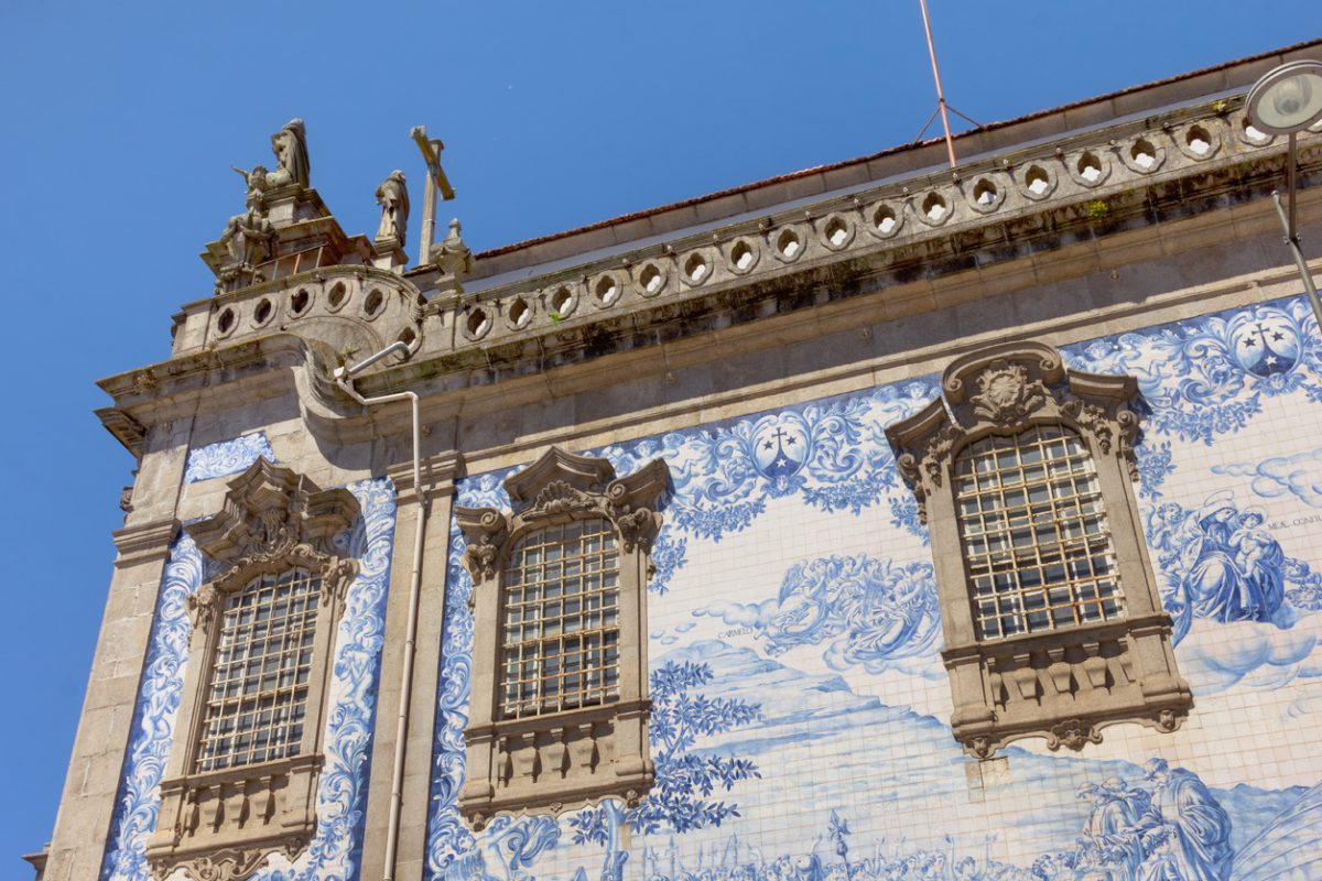 Porto, Portugal - June 16, 2018:Side wall of Carmo and Carmelitas Church with its famous blue and white tiles.