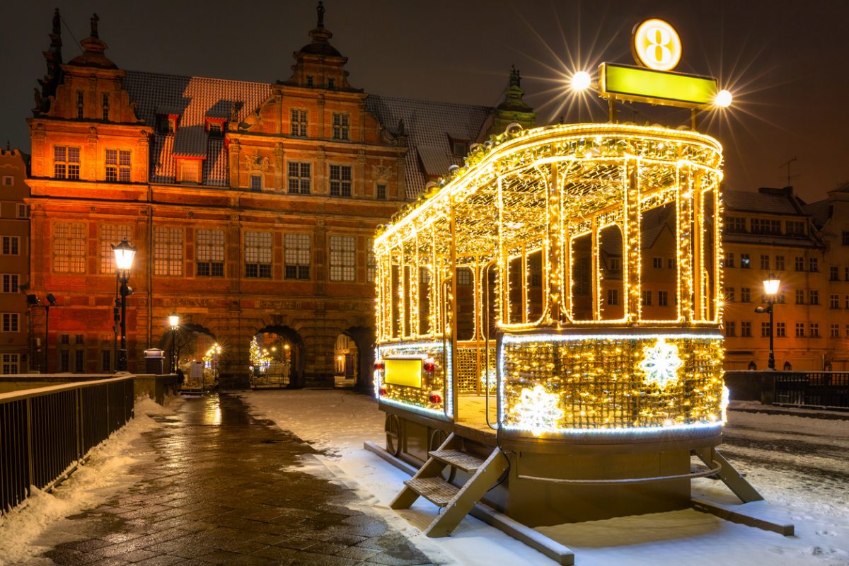 Illuminated tram with Christmas lights on the Green Bridge in Gdansk. Poland