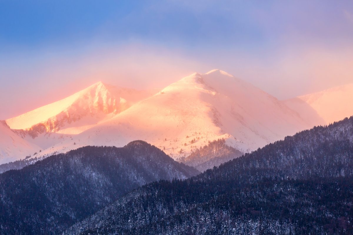 Bansko, Bulgaria travel winter landscape panorama of snow Pirin mountain peaks at sunrise