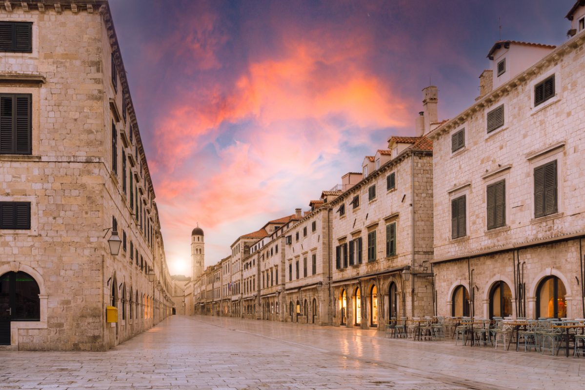 view of the main street in the old town of Dubrovnik city in Croatia at sunset"r"n