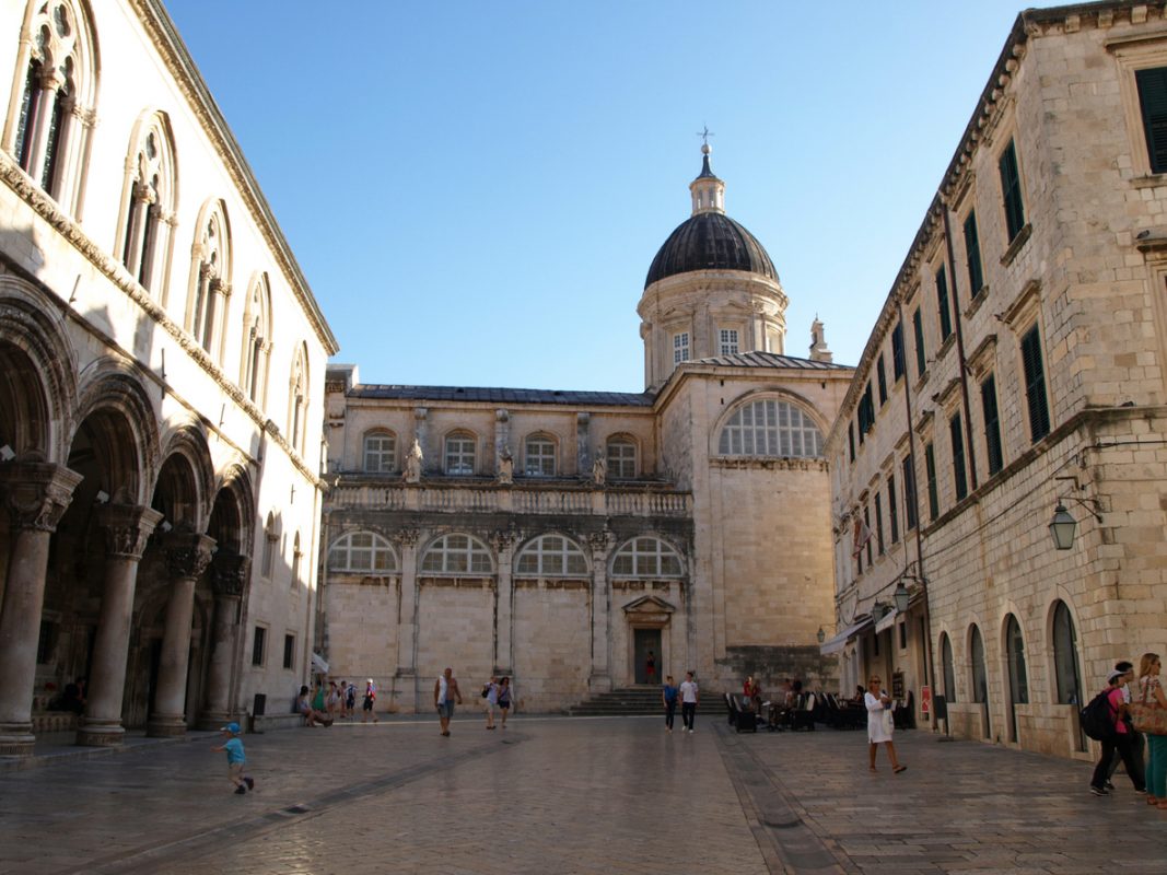 DDubrovnik, Croatia - September 25, 2012: Tourists from all over the world on the Luza square. Rector's Palace (Knezev dvor) and temples of Dubrovnik.