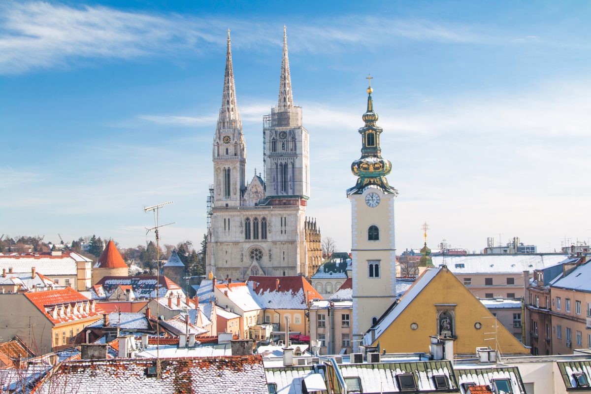 Panoramic view of cathedral in Zagreb, Croatia, from Upper town, winter, snow on roofs