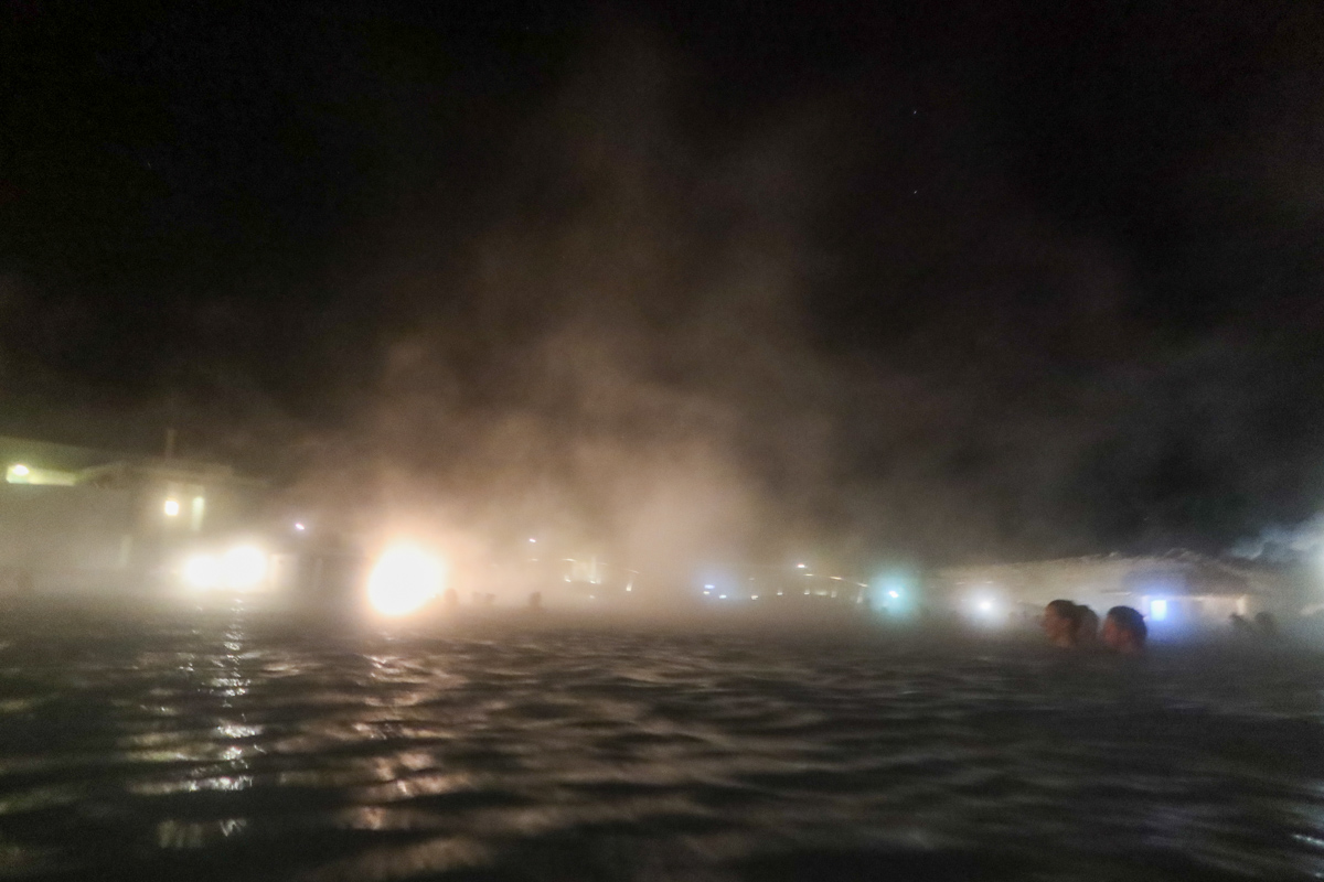 Steam rising above the hot water of the blue lagoon in Iceland.