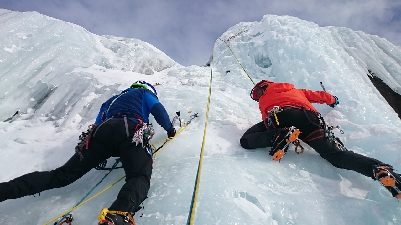 Ice climbing up one of the frozen walls at the glacier