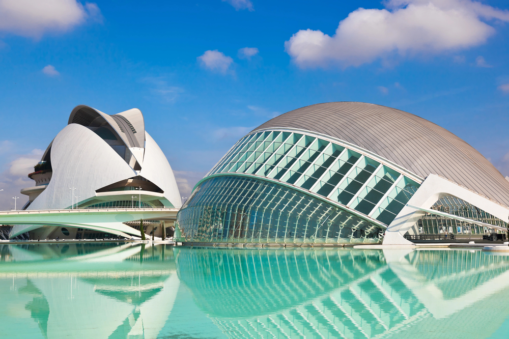 Sunny weather in Valencia with water in the foreground and domes in the background